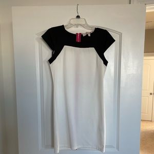 Black and white mini dress with bright pink zipper on the back. Size medium
